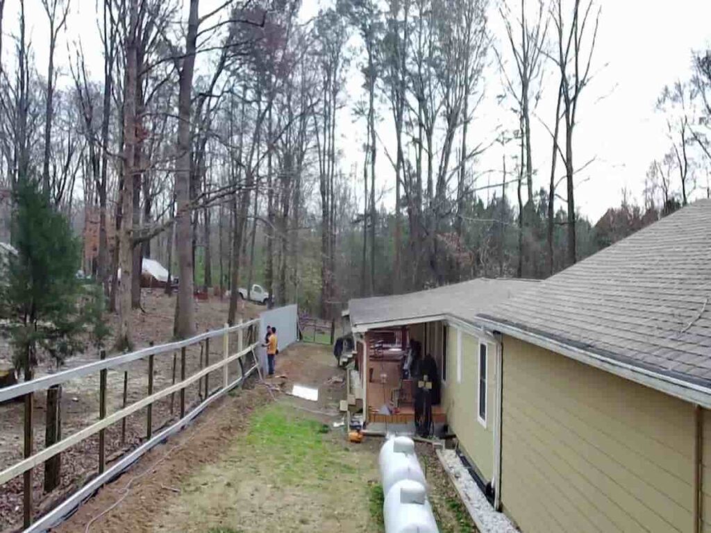 Metal Privacy Fence And Drainage System In Dallas, Ga